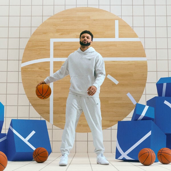 Jamal Murray dribbling in front of blue boxes. Jamal Murray dribbling in front of blue boxes. 