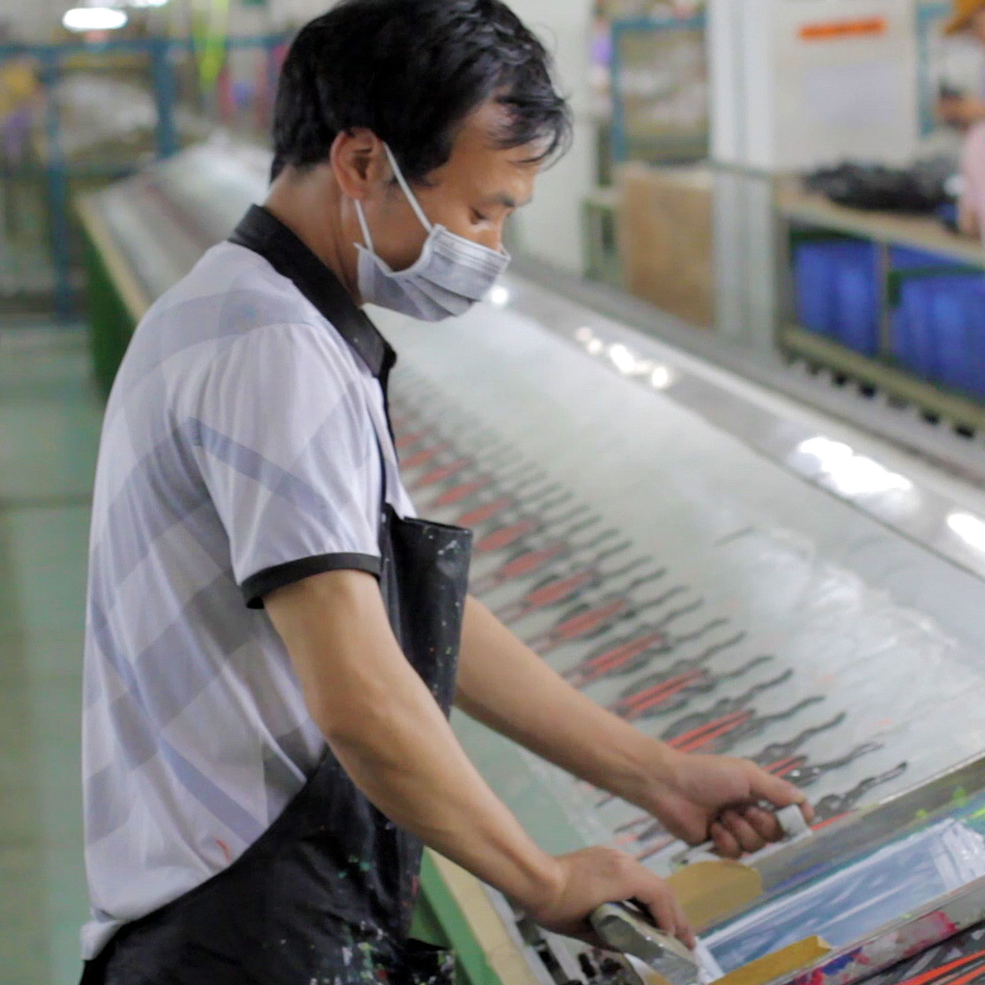 Male factory worker on the assembly line