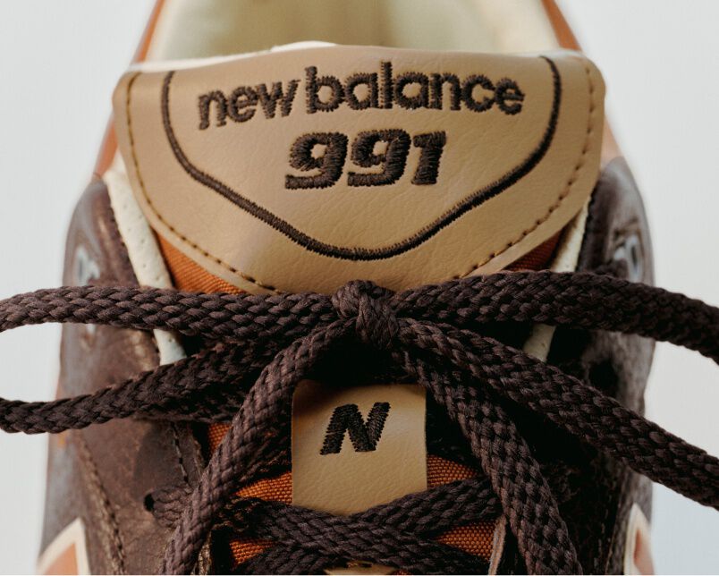 Close up view of a New Balance Made in UK sneaker tongue and laces.  